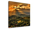 Clasic tablou pe pânză cu motivul munți, pădure, apus de soare, nori, peisaj în maro-verde nuanțe, atmosferă dramatică, natură și atmosferă liniștită – principală