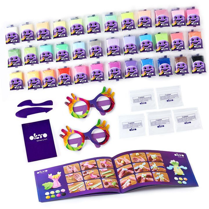 Un set de artă senzorială cu plastilină colorată, ochelari de joacă și instrucțiuni, așezat pe o suprafață albă, Papilora.